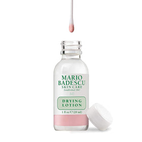 Mario Badescu close-up of pink sediment in bottle highlighting active ingredients