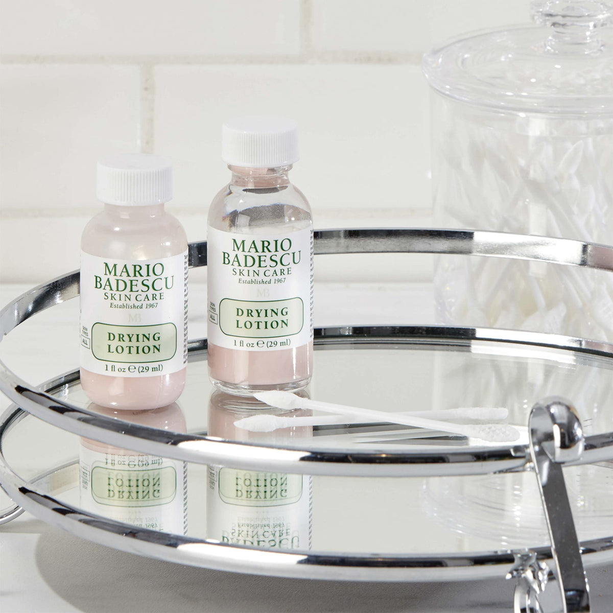 Mario Badescu bottle on bathroom shelf signaling ritual-ready skincare