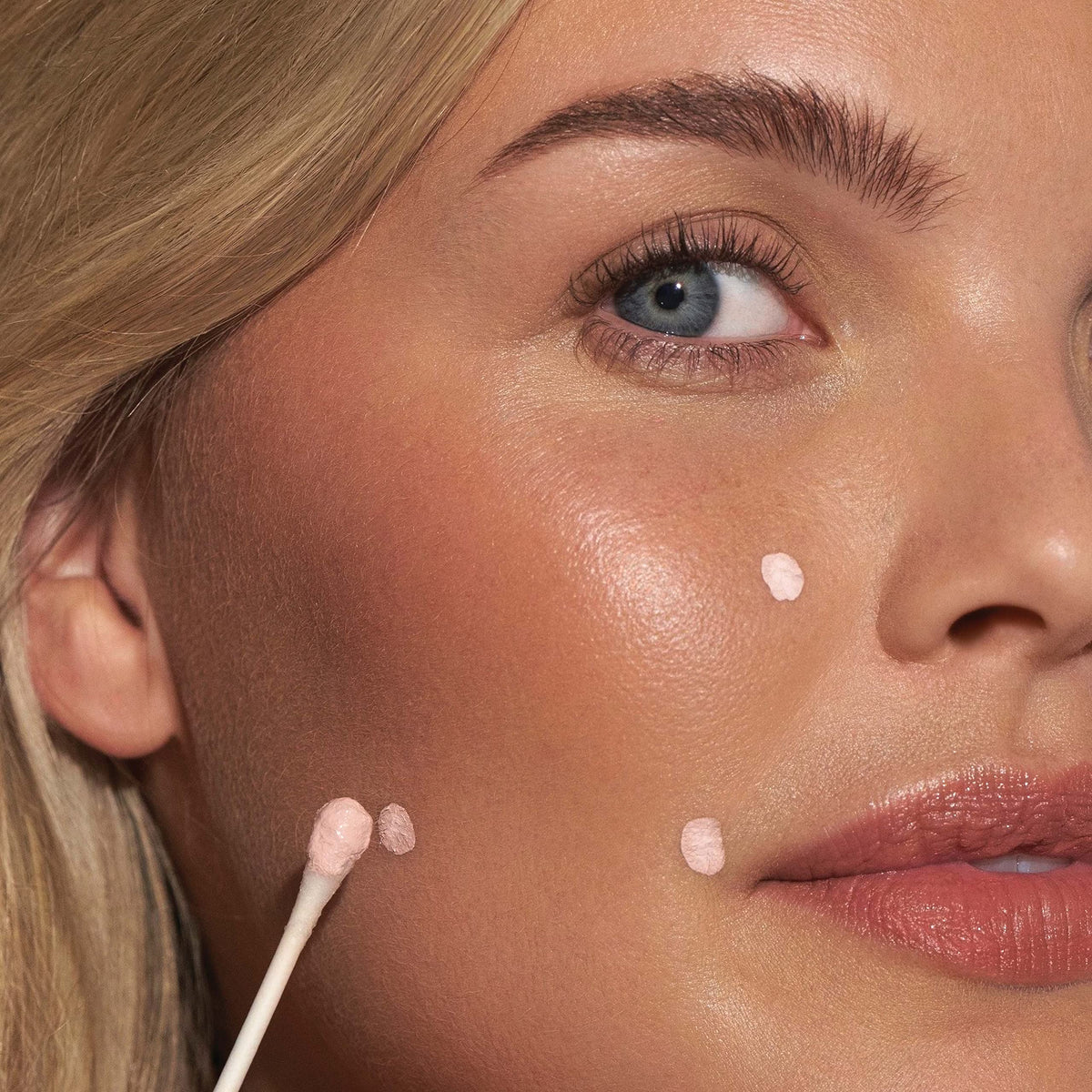 Mario Badescu two-phase liquid with pink top and white bottom to apply top layer