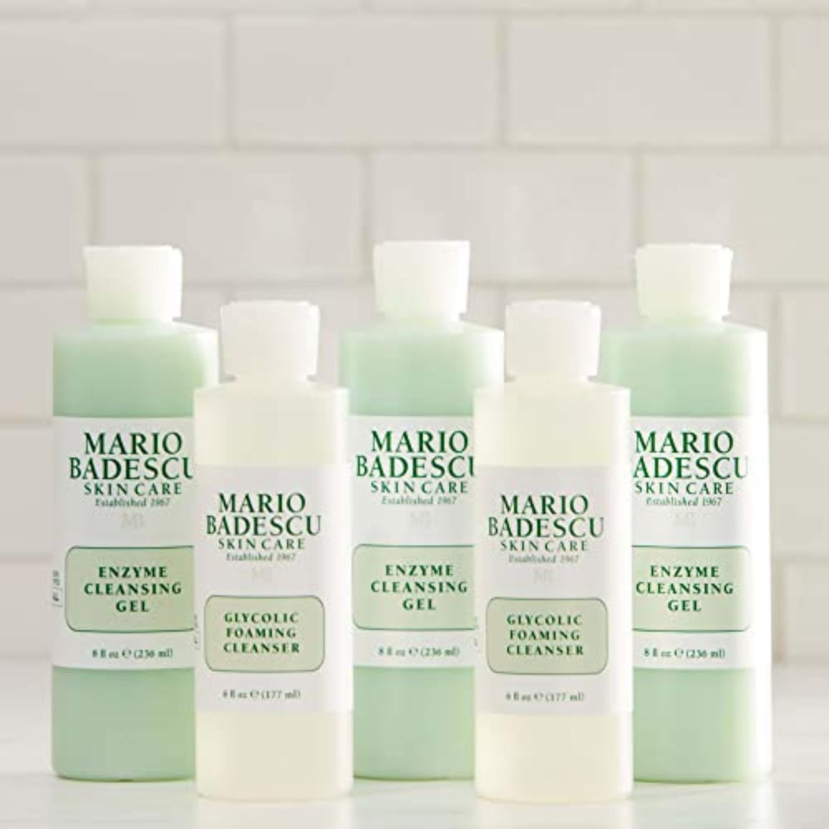 Mario Badescu bottle next to ruler showing 8 fl oz scale and portability