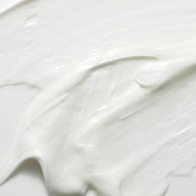 Mario Badescu open jar texture close-up highlighting lightweight absorbent cream benefit