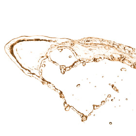 Mario Badescu nozzle close-up demonstrating fine mist for even coverage