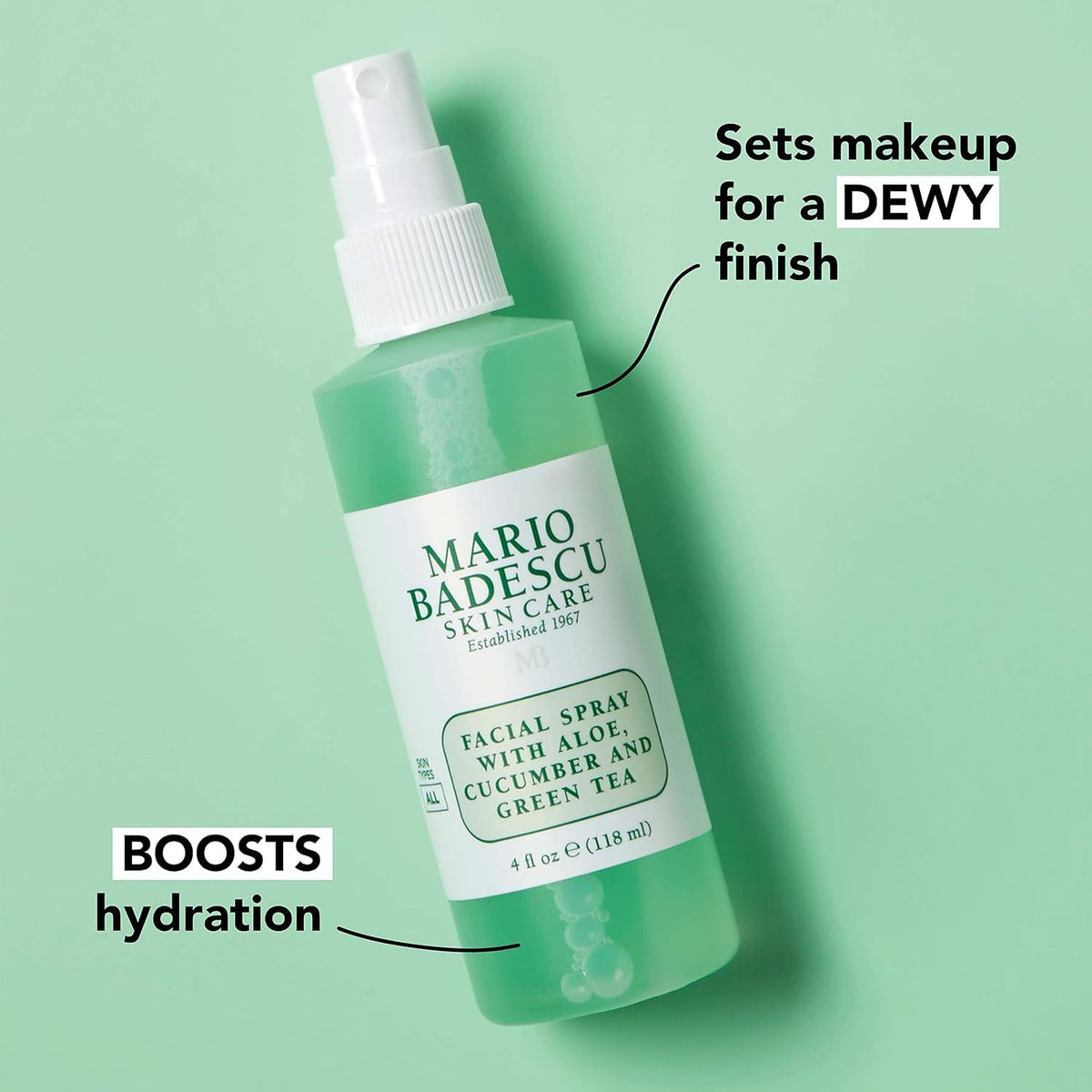 Mario Badescu hand holding bottle scale revealing generous 8 fl oz size