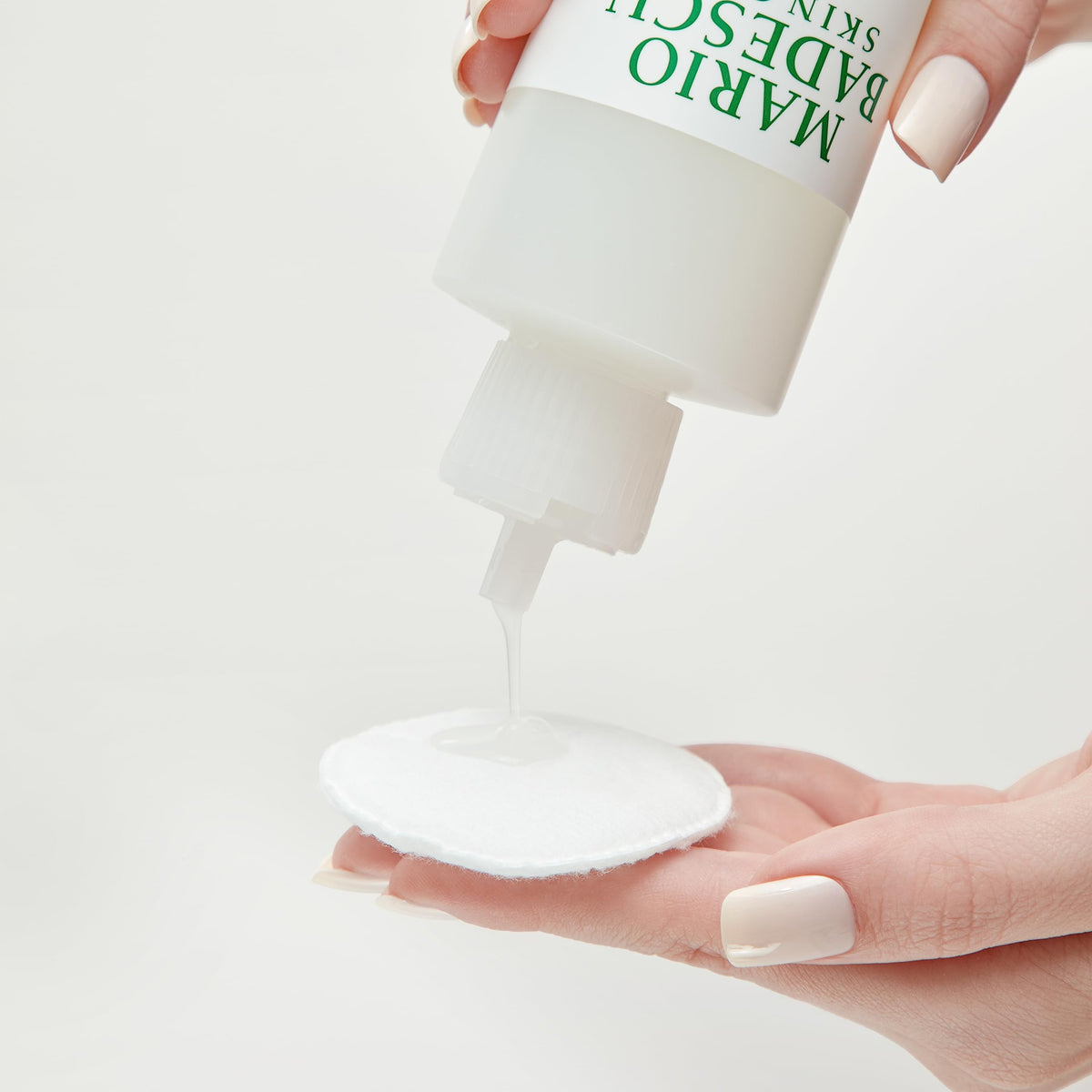 Mario Badescu product applied on hand demonstrating easy absorption and plumpness