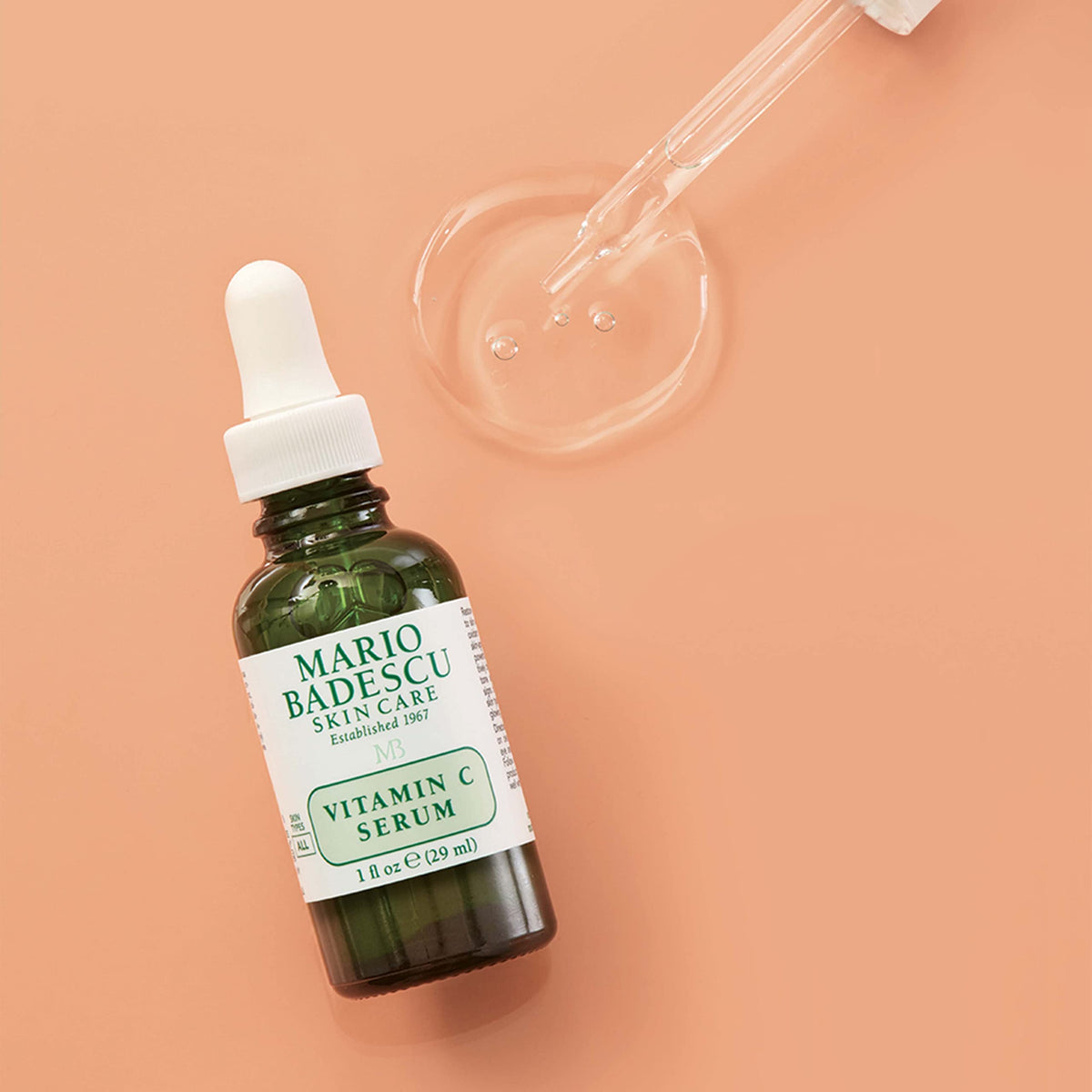 Mario Badescu styled nighttime routine scene showing layering with night cream