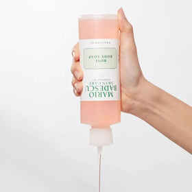 Mario Badescu bottle next to common items showing the 8 fl oz scale