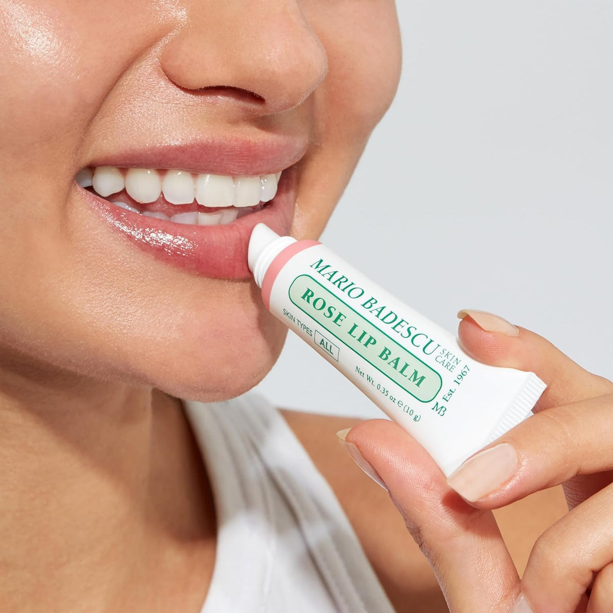 Mario Badescu bedside jar staged as an overnight lip mask to restore moisture while sleeping