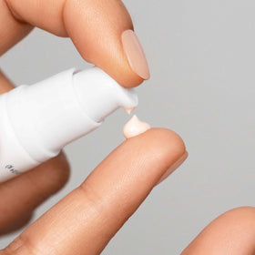 Mario Badescu serum dropper dispensing a bead for precise application