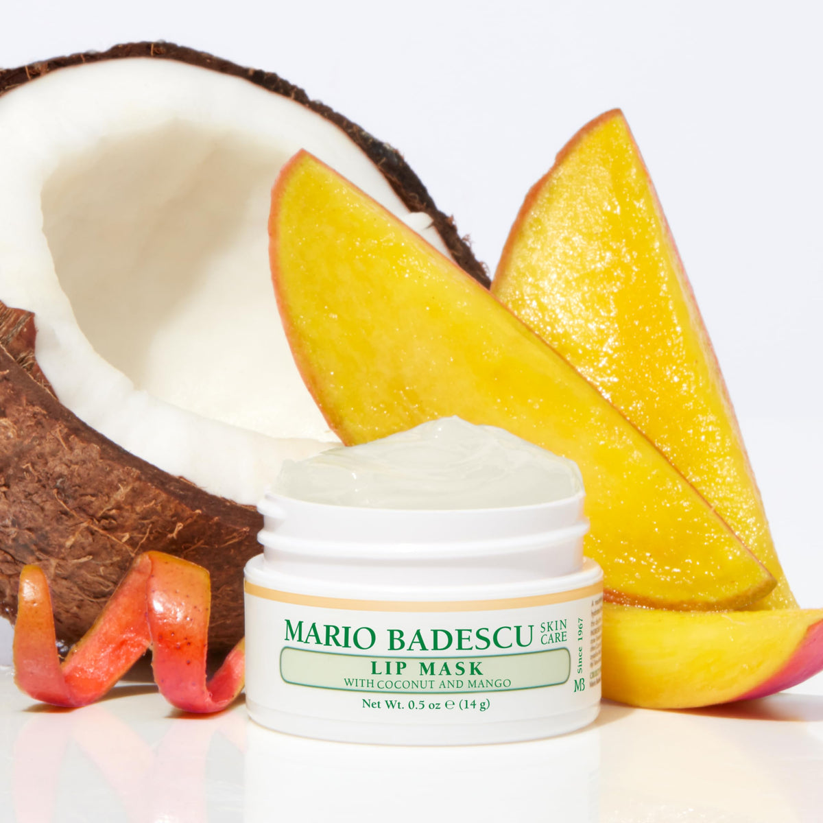 Mario Badescu 0.5 oz jar beside coin shows compact travel-ready size