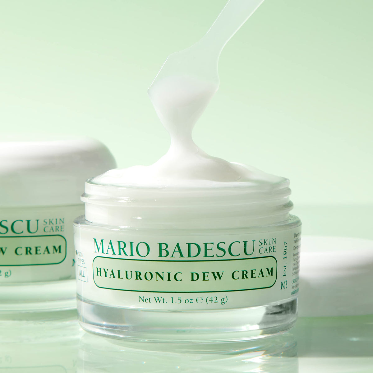 Mario Badescu 1.5 oz jar beside ruler showing compact travel-friendly size
