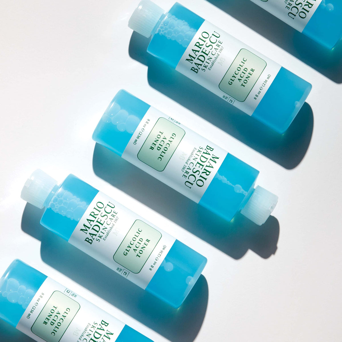 Mario Badescu next to ruler for 8 fl oz size clarity and travel-friendly benefit