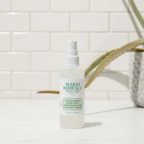 Mario Badescu spray applied over makeup delivering a radiant set and glow