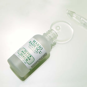 Mario Badescu serum on bathroom vanity lifestyle shot for everyday routine inspiration
