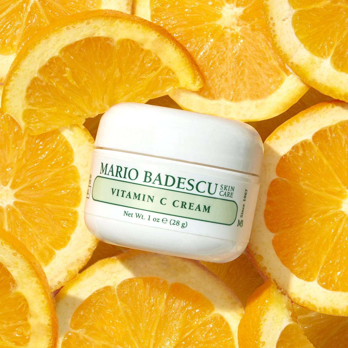 Mario Badescu cream applied under sunscreen demonstrating daytime layering benefit