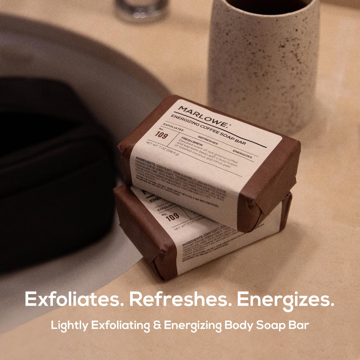 MARLOWE. close-up of bar texture showing coffee scrub granules for exfoliation
