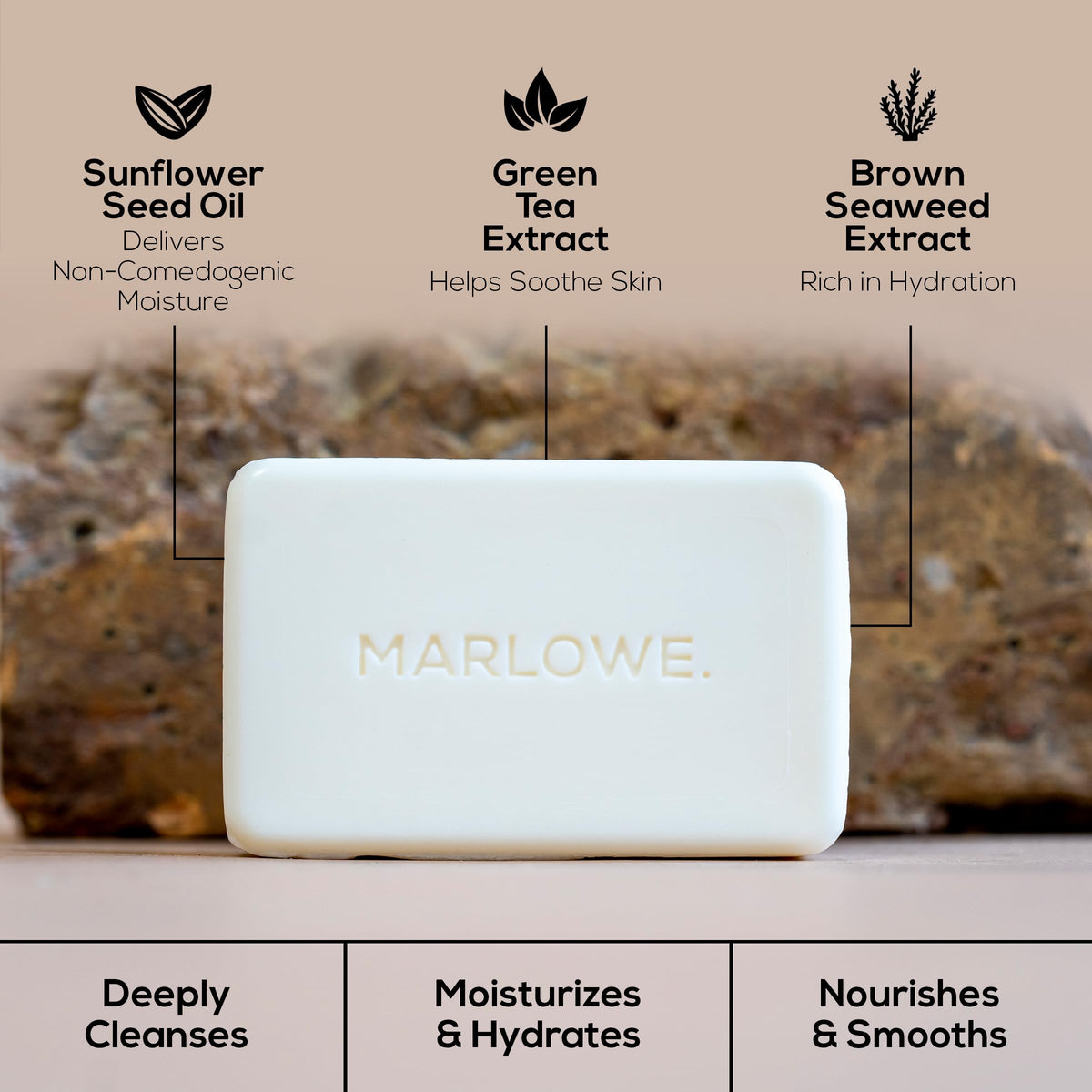 MARLOWE. soap on bathroom shelf in styled setting, suggests everyday grooming use