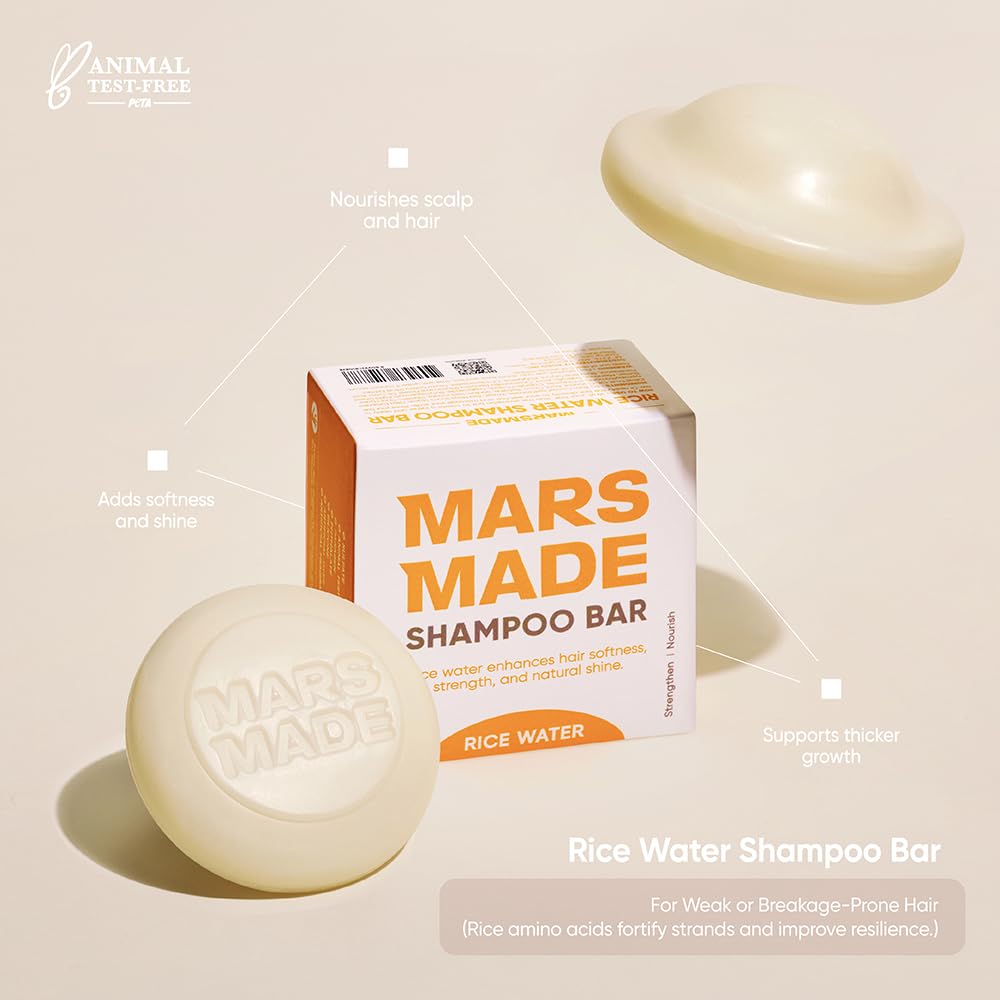 MARS MADE hand creating rich lather with shampoo bar, demonstrates dense foam and gentle cleanse