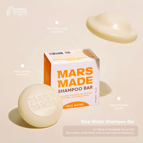 MARS MADE hand creating rich lather with shampoo bar, demonstrates dense foam and gentle cleanse