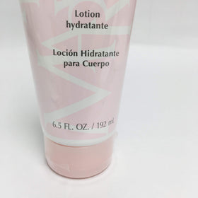 Mary Kay hydrating lotion held in hand for size comparison and travel convenience
