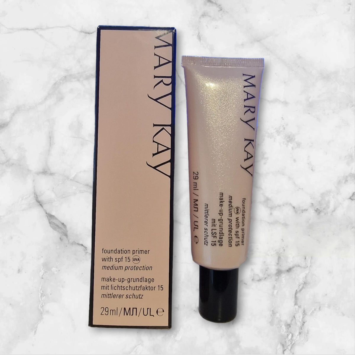 Mary Kay primer texture close-up demonstrating smoothing finish