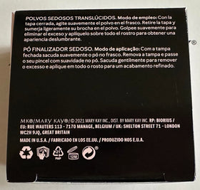Mary Kay powder inside a makeup bag for quick touch-ups on the go