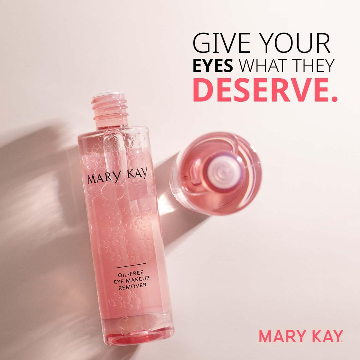Mary Kay bottle next to compact showing 3.75 fl oz scale for travel convenience