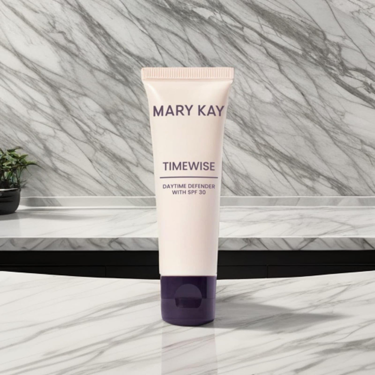 Mary Kay Timewise next to a coin for size comparison and travel convenience
