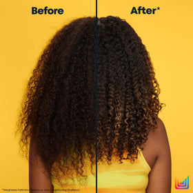 MATRIX applying oil on curly hair to control frizz and define curls