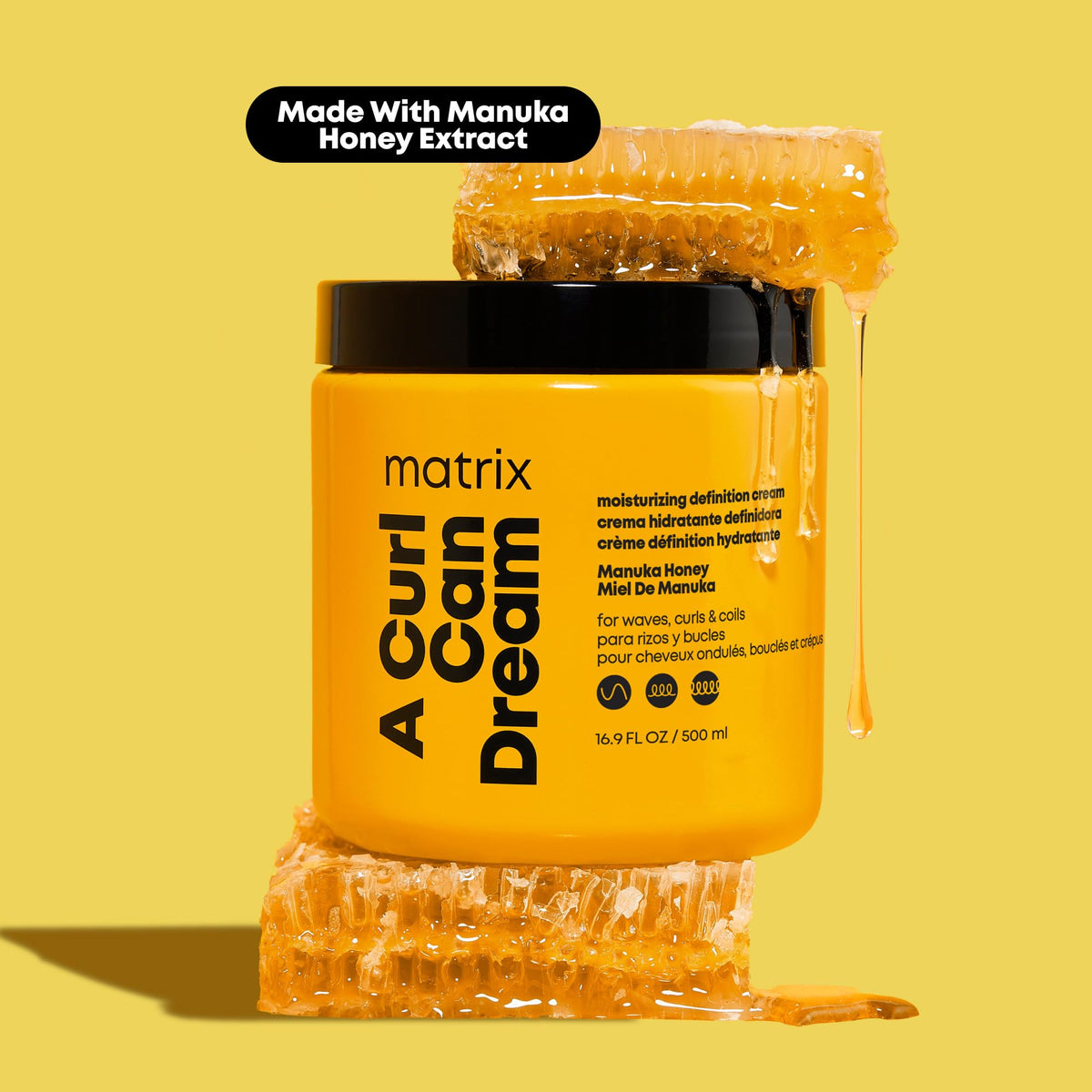 Matrix being applied to wet curls, aids detangling and curl definition