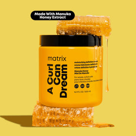 Matrix being applied to wet curls, aids detangling and curl definition
