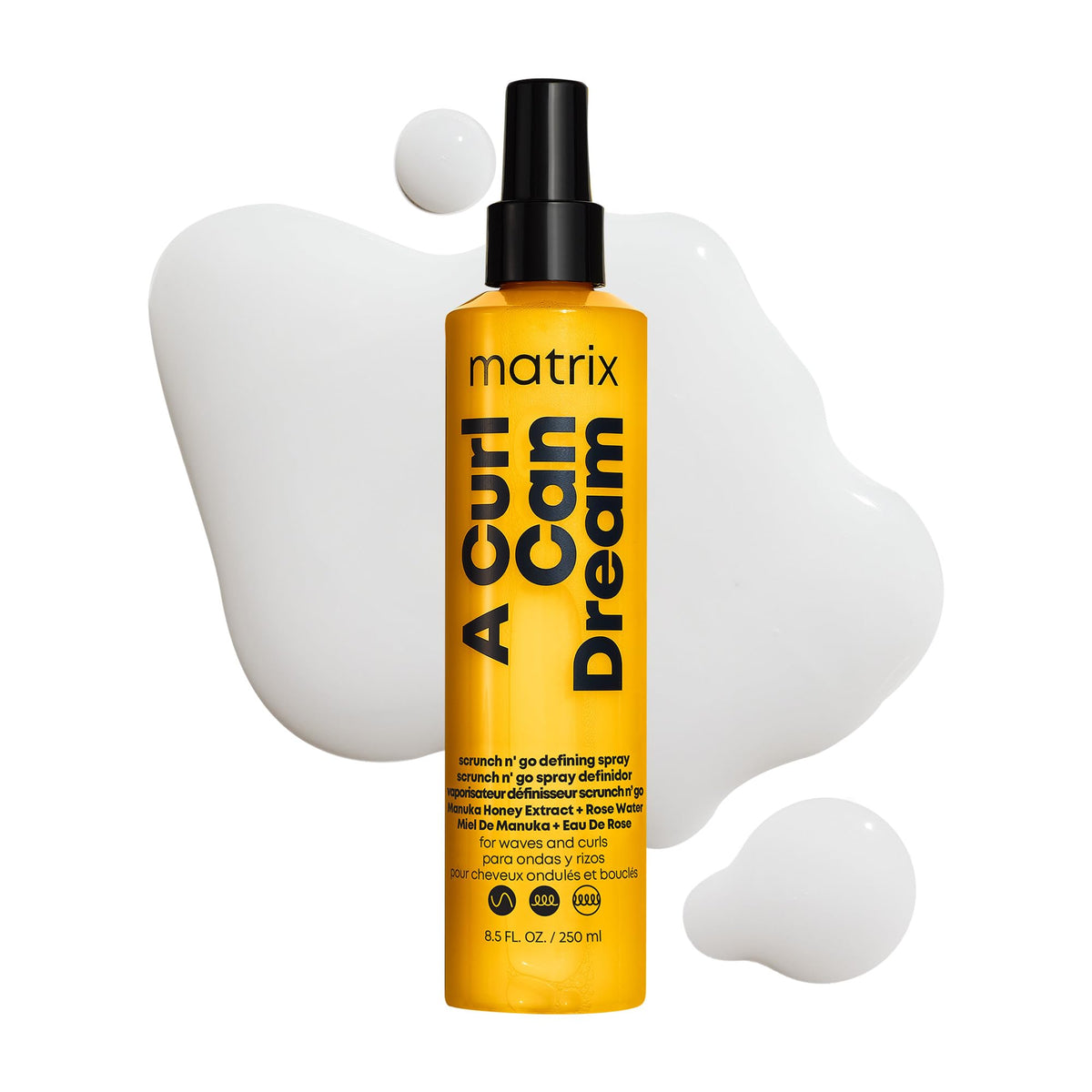 Matrix bottle front view showing label and lightweight defining spray benefits