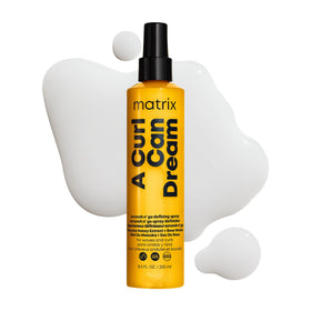 Matrix bottle front view showing label and lightweight defining spray benefits