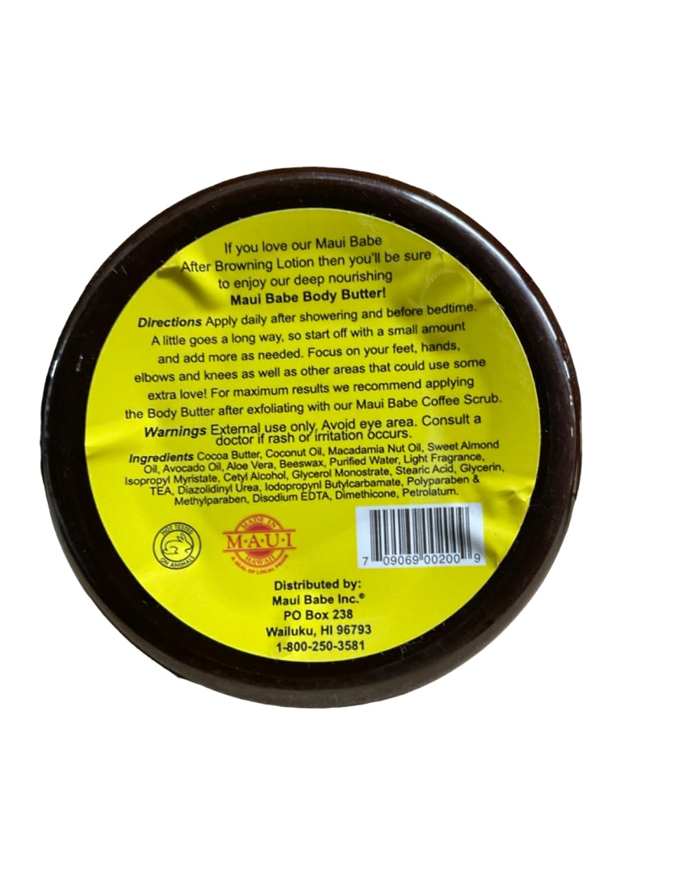 Maui Babe applied to forearm demonstrating smooth spreadability and immediate moisturizing benefit