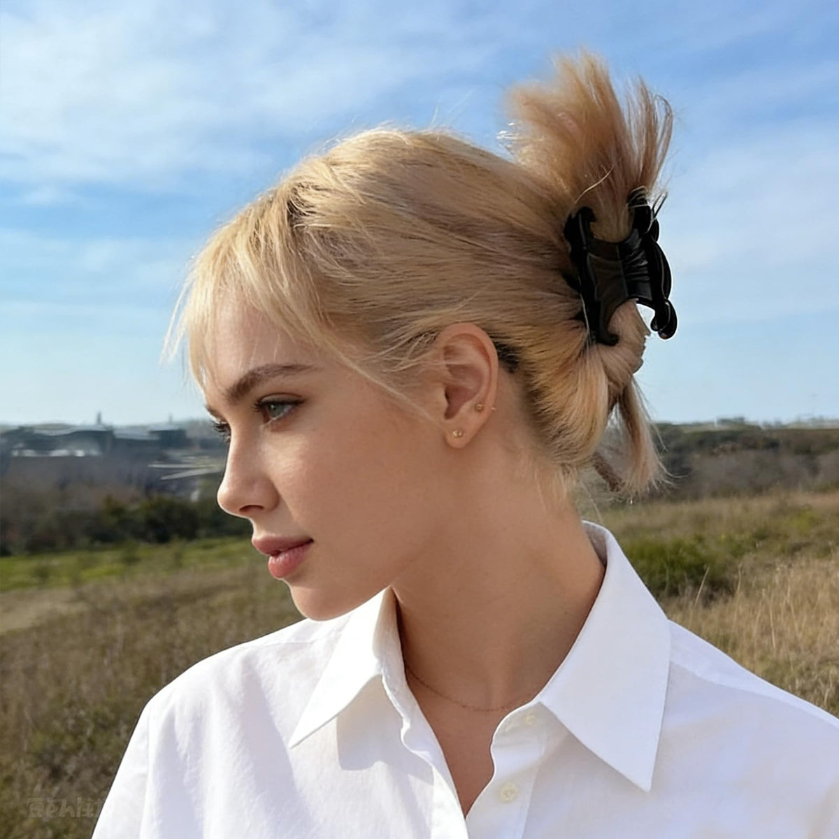 Maxwhale clip in use in a half-up style for quick hair control