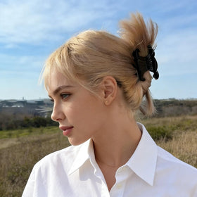 Maxwhale clip in use in a half-up style for quick hair control