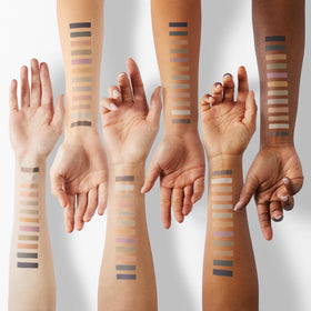 Maybelline dual-ended applicator next to pans for quick application benefits