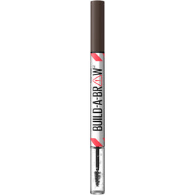Maybelline Build-A-Brow lifestyle shot applying product at vanity for quick polished brows