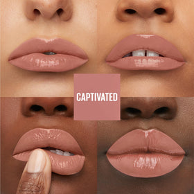 Maybelline Captivated swatch on arm displaying rich pink pigment and instant shine