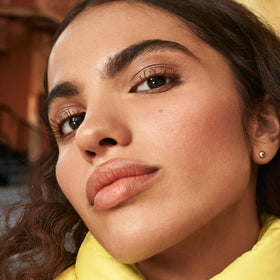 Maybelline Colossal Bubble lifestyle model wearing copper brown for natural dramatic lashes