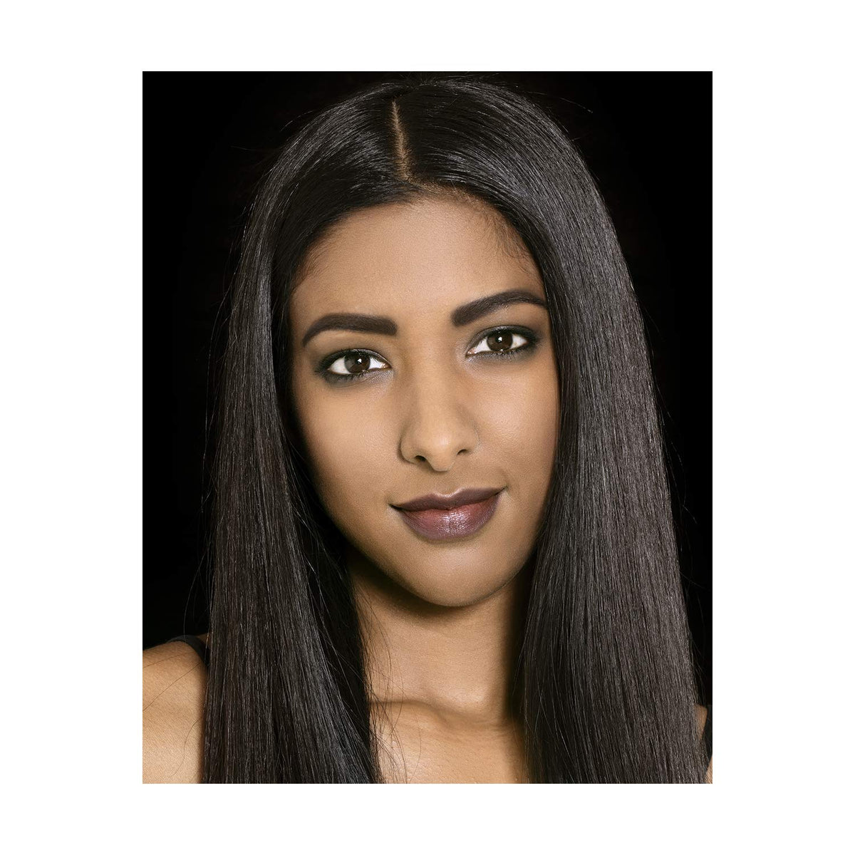 Maybelline deep brown swatch on skin demonstrating buildable color payoff