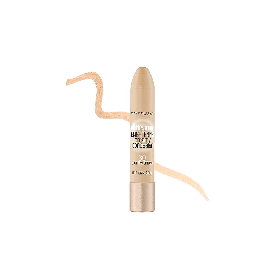 Maybelline concealer held in hand showing compact travel-friendly size