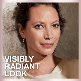 Maybelline lifestyle image in city setting showing radiant makeup for daily wear