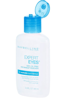 Maybelline bottle next to coin for scale, compact travel-friendly size benefit