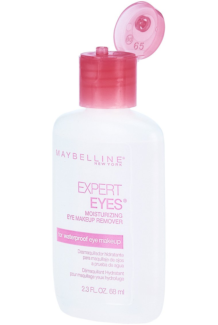 Maybelline bottles beside passport illustrating travel-ready two-count supply and portability