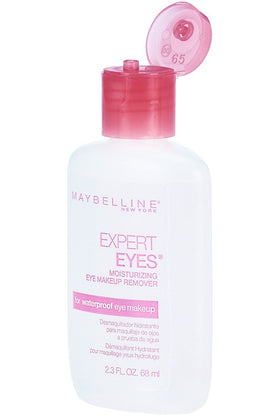 Maybelline bottles beside passport illustrating travel-ready two-count supply and portability