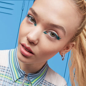 Maybelline emerald swatch on skin showing saturated pigment payoff