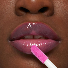 MAYBELLINE lifestyle image of Peach Fever worn with evening makeup illustrating glossy, plumped results