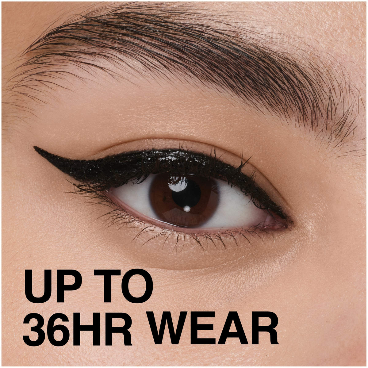 Maybelline eyeliner held in hand showing compact 0.08 fl. oz. travel size