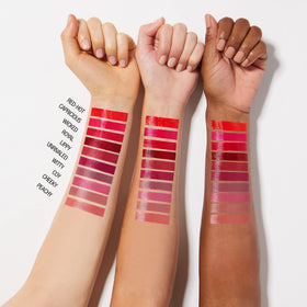 Maybelline worn in evening setting illustrating dramatic glossy wine red glamour