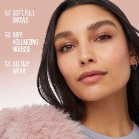 Maybelline Superfluff fluff brush closeup depositing product to coat and separate brow hairs
